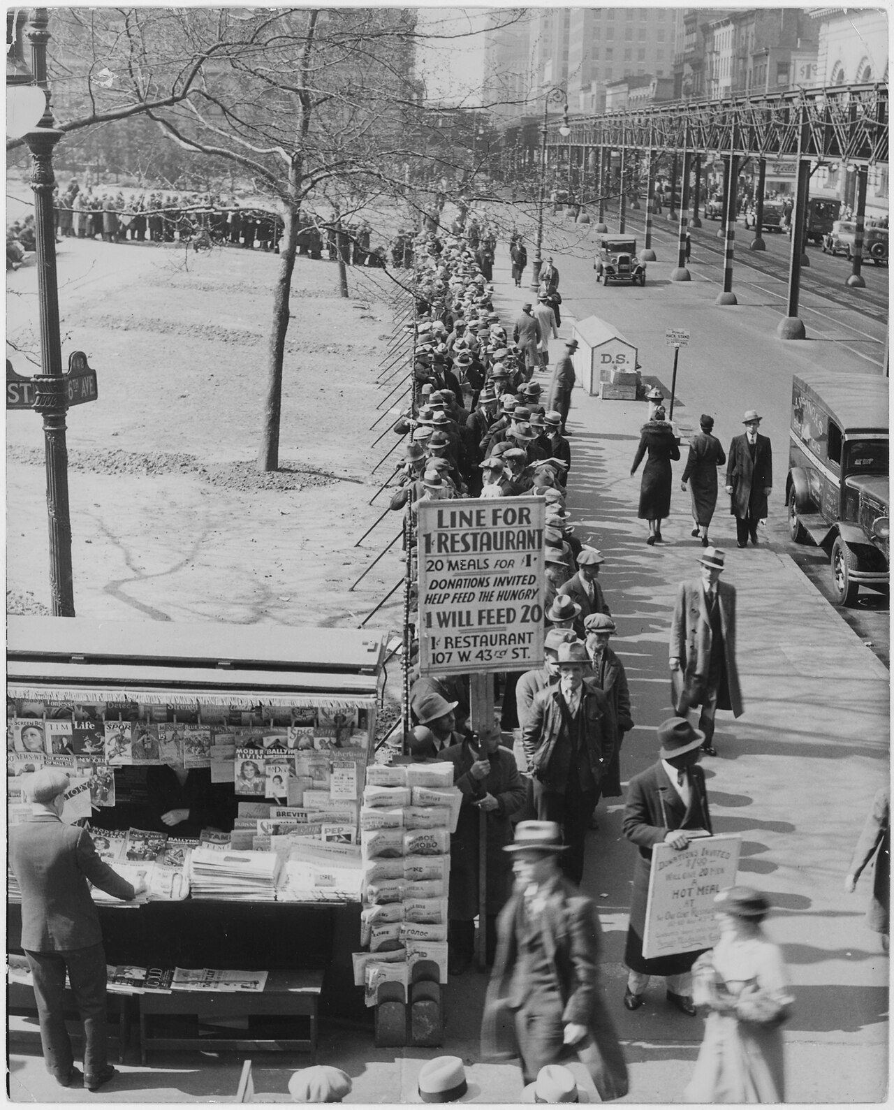 A long queue of people in coats and hats waiting to be fed, New York City, 1932